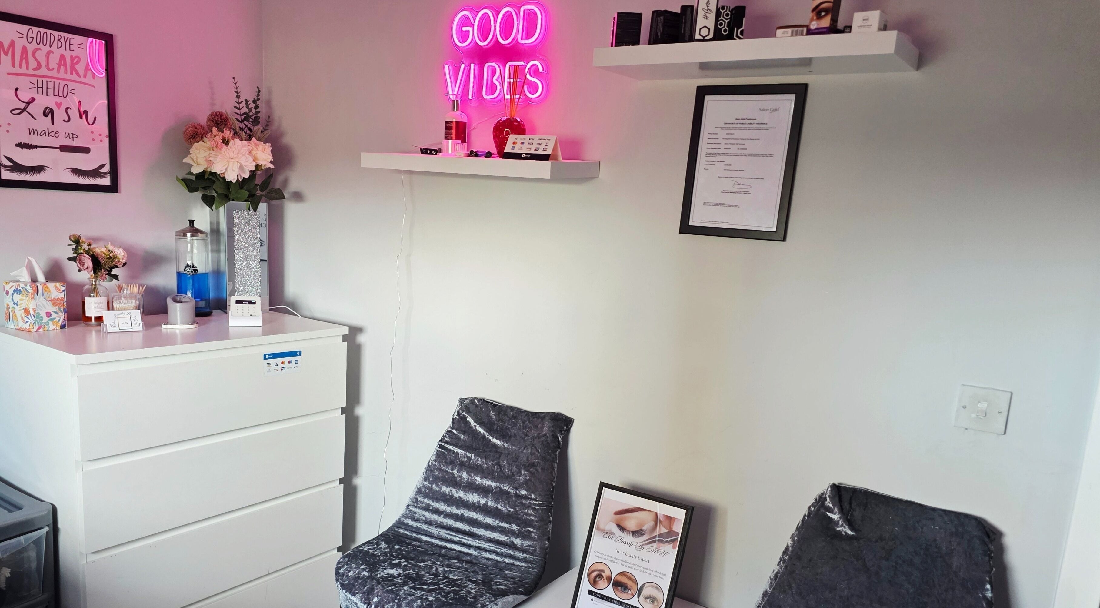 Cozy decor at Chic Beauty By M.W, Edinburgh, Scotland, GB with 'Good Vibes' neon sign.