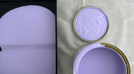 Lilac paint cans on canvas at Tiny Tree Kids Yoga, Broadbeach, Queensland, AU. Perfect for a calming atmosphere.
