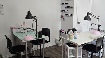 Modern nail station setup at Flexia Ongles & Soins, Saint-Jacques, CA, featuring tools and products.