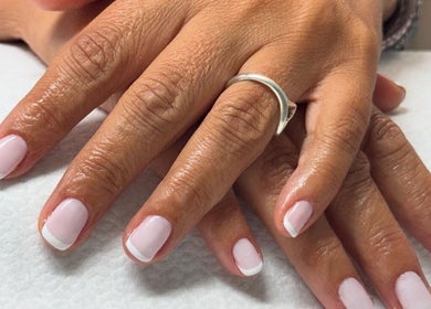 Sophisticated French manicure at Glam nails by sheemu in Roma, Lazio, IT. Perfectly polished nails on display.