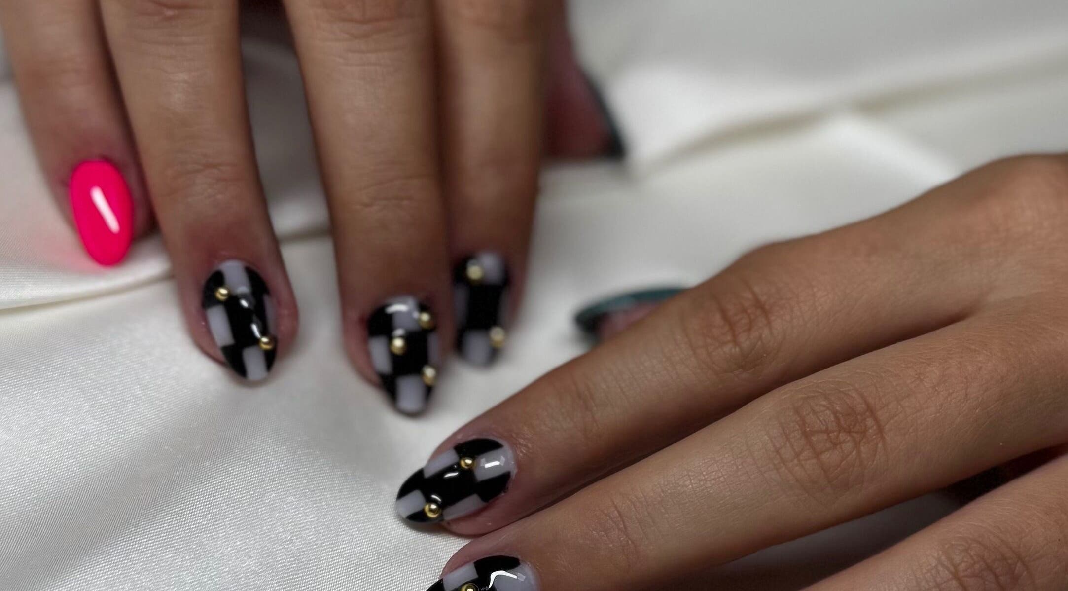 Chic nail art with black, gray, and pink design at Kai Nails, Aguada, Aguada, PR.