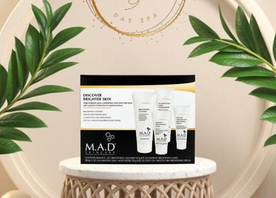 M.A.D skincare products at Pamper Me Fabulous Day Spa, Chaguanas, Chaguanas, TT with lush green leaves.