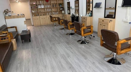 Modern styling chairs and shelves at The Glam Loft in Auckland, Auckland, NZ welcoming clients for beauty treatments.