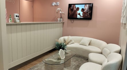 Elegant reception area at Miki Japanese Massage, North Sydney, New South Wales, AU with plush seating and decor.