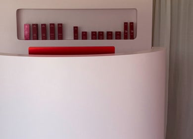 Elegant reception area at Isla Grace Beauty Studio in Butler, Western Australia, AU with product display.