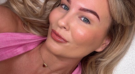 Client with glowing skin at Isla Grace Beauty Studio in Butler, Western Australia, AU, showcasing natural beauty.