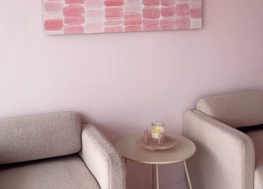 Cozy seating area at Isla Grace Beauty Studio in Butler, Western Australia, AU with soft decor.