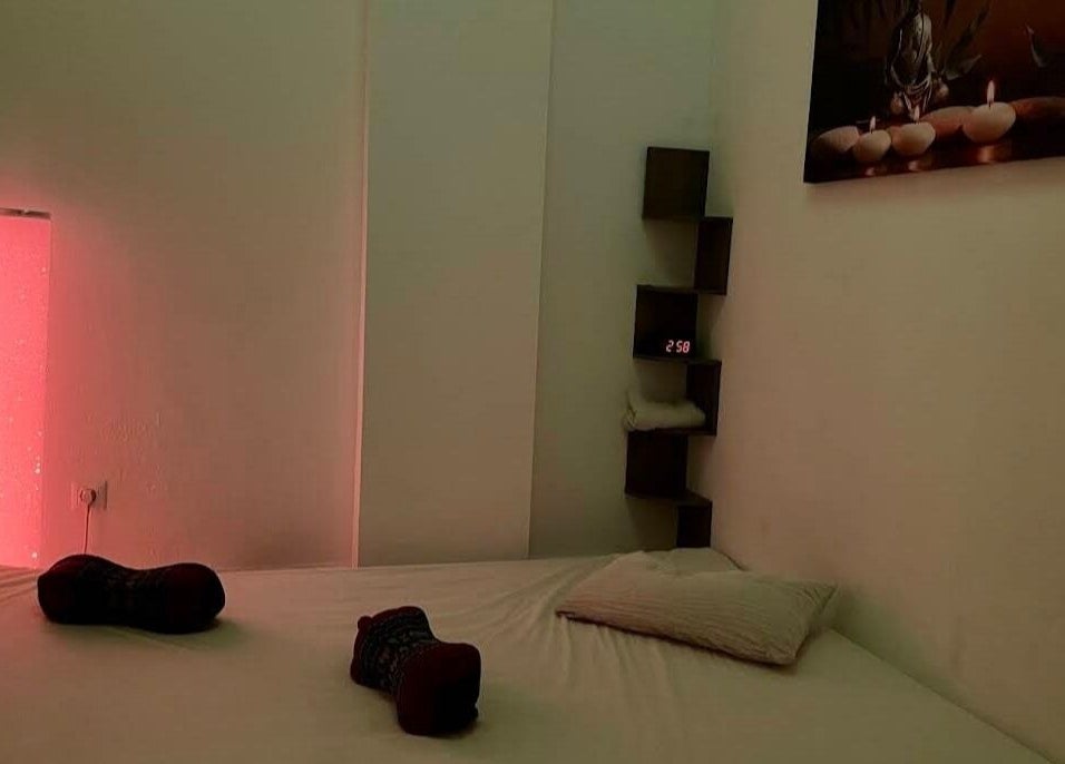 Relaxing massage room with soft lighting at Chris Massages, Berlin, Berlin, DE.