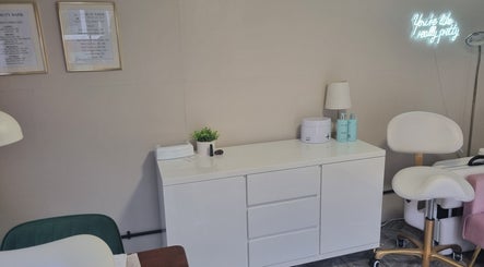 Calm beauty salon interior at Beauty Bank, Clitheroe, England, GB featuring modern decor and cozy seating.