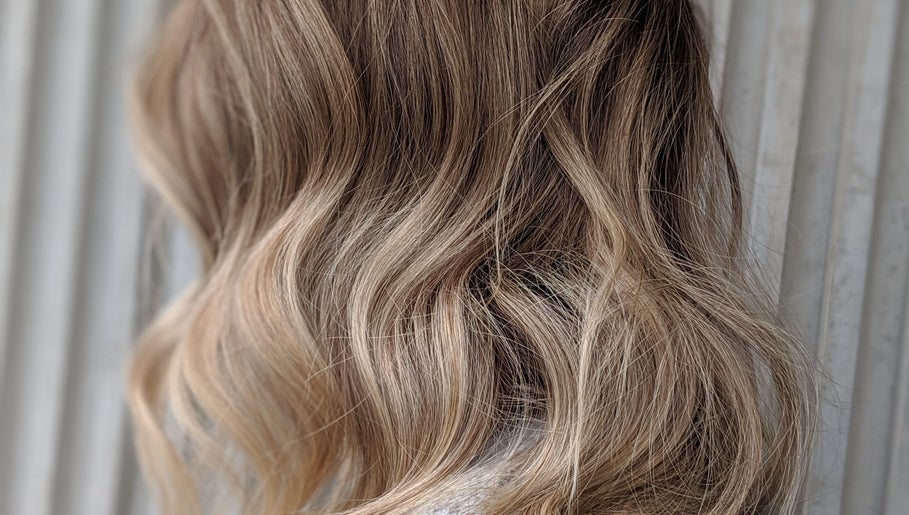 Elegant blonde waves styled at Jarod.hair, Surry Hills, New South Wales, AU.