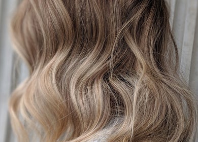 Elegant blonde waves styled at Jarod.hair, Surry Hills, New South Wales, AU.