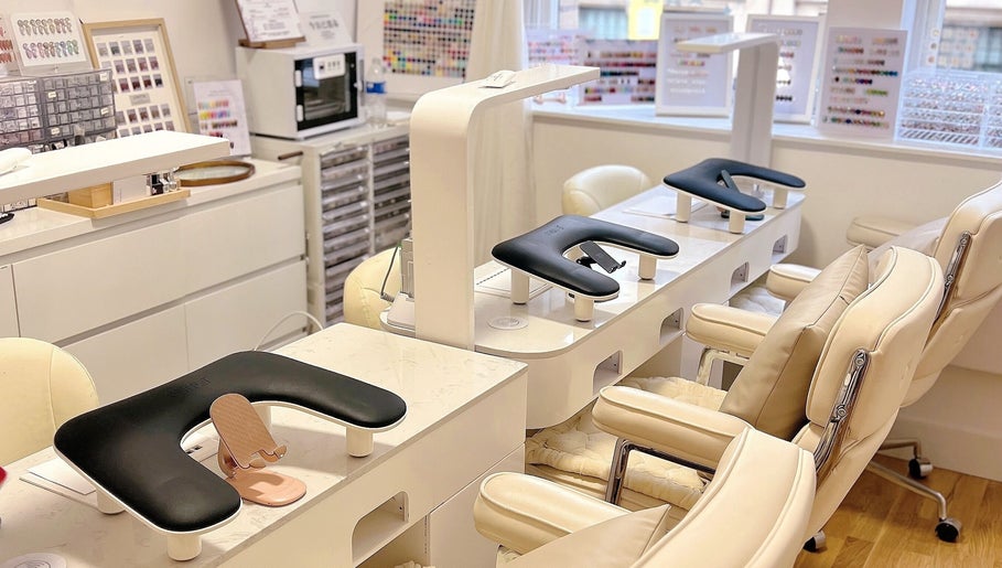Modern manicure station at Bella Naillash in Manchester, England, GB, showcasing contemporary nail care setup.