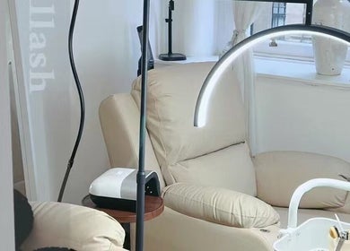 Comfortable seating area for nail services at Bella Naillash, Manchester, England, GB.