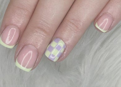 Stylish nail art with checkered design at Haus of Pixiee, Pontyclun, Wales, GB.