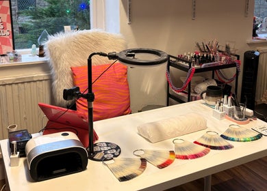 Haus of Pixiee nail studio setup with colorful gel options in Pontyclun, Wales, GB.
