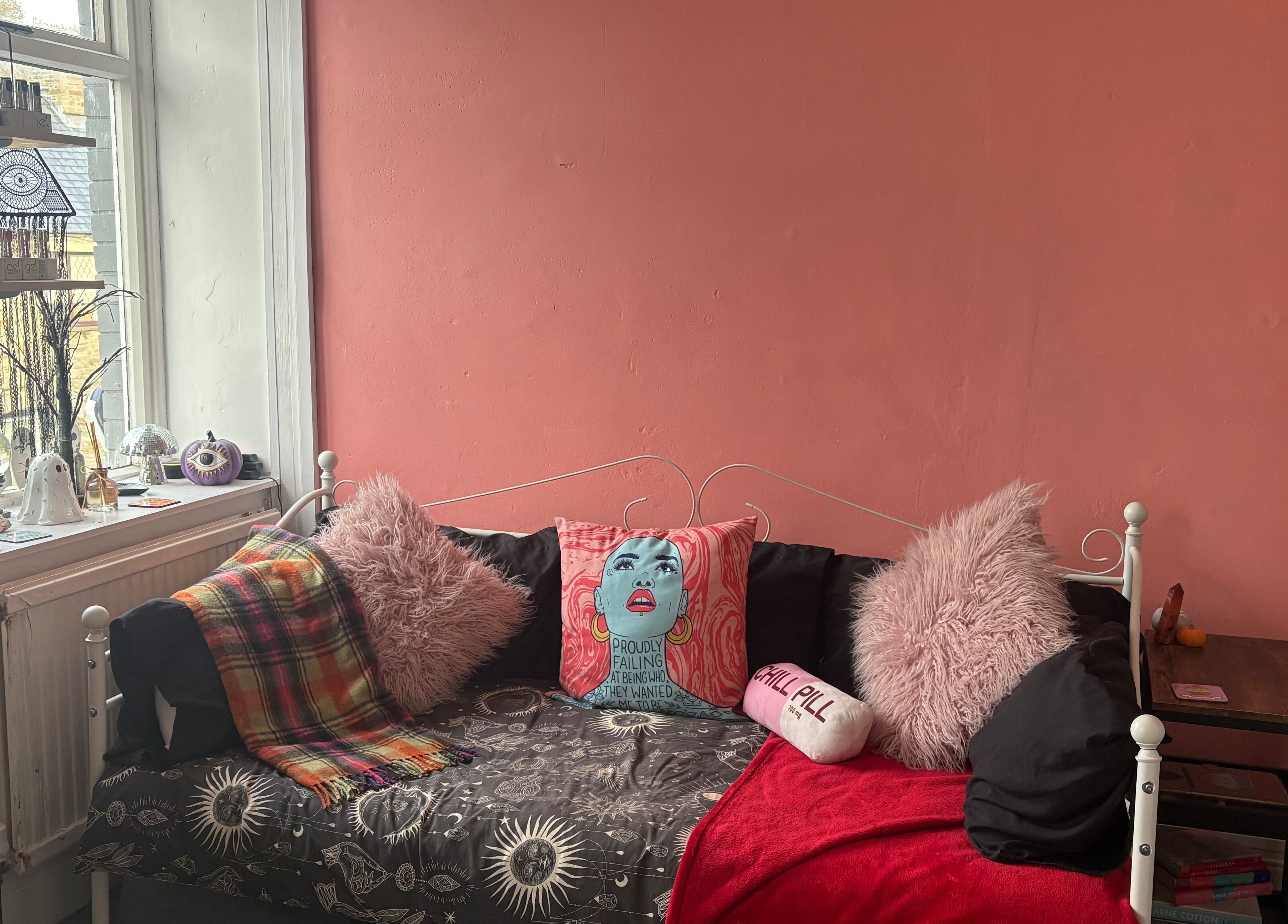 A cozy lounge area with eclectic decor at Haus of Pixiee, Pontyclun, Wales, GB.