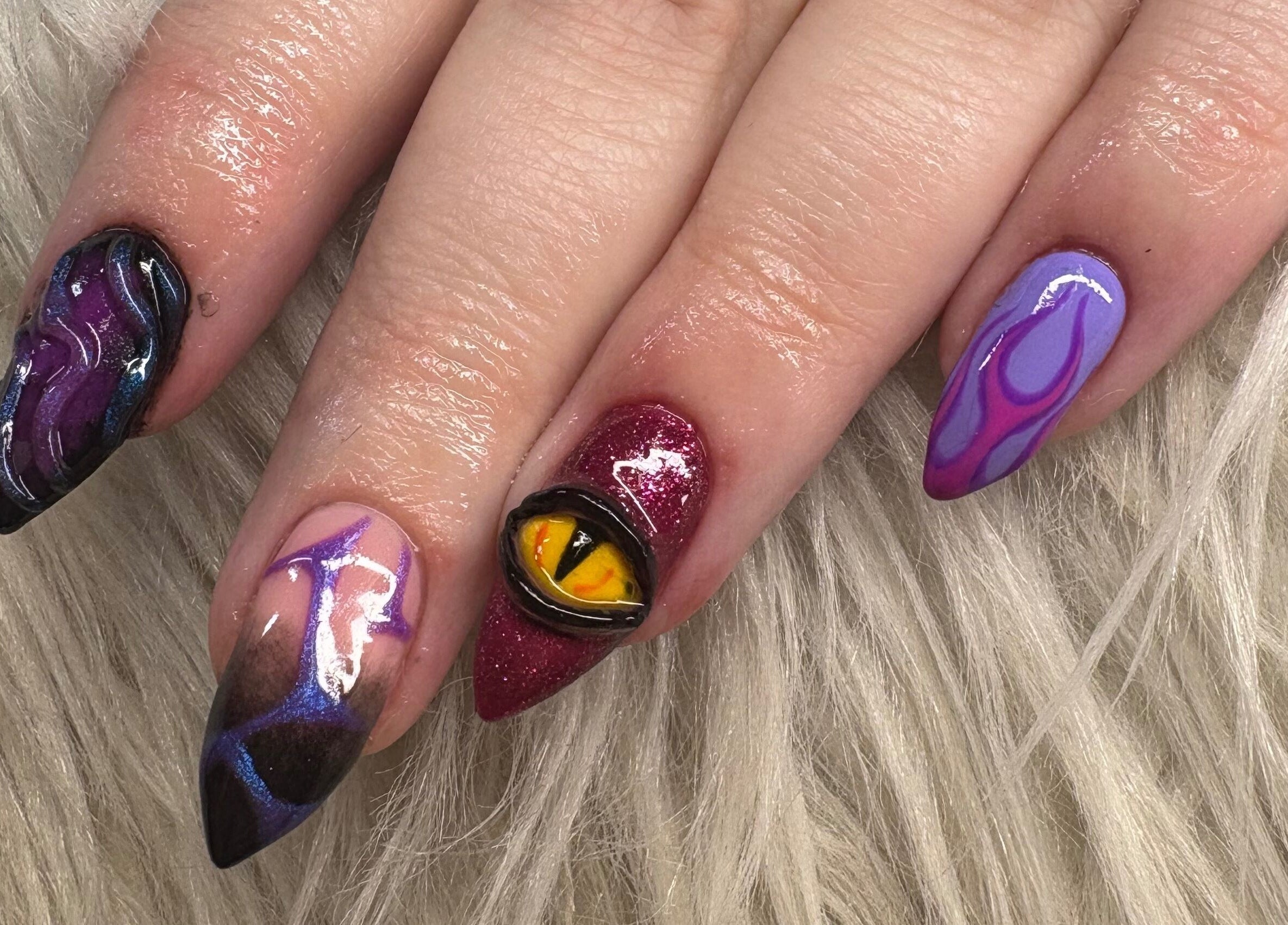Intricate nail art design at Haus of Pixiee in Pontyclun, Wales, GB, featuring vibrant colors and unique patterns.