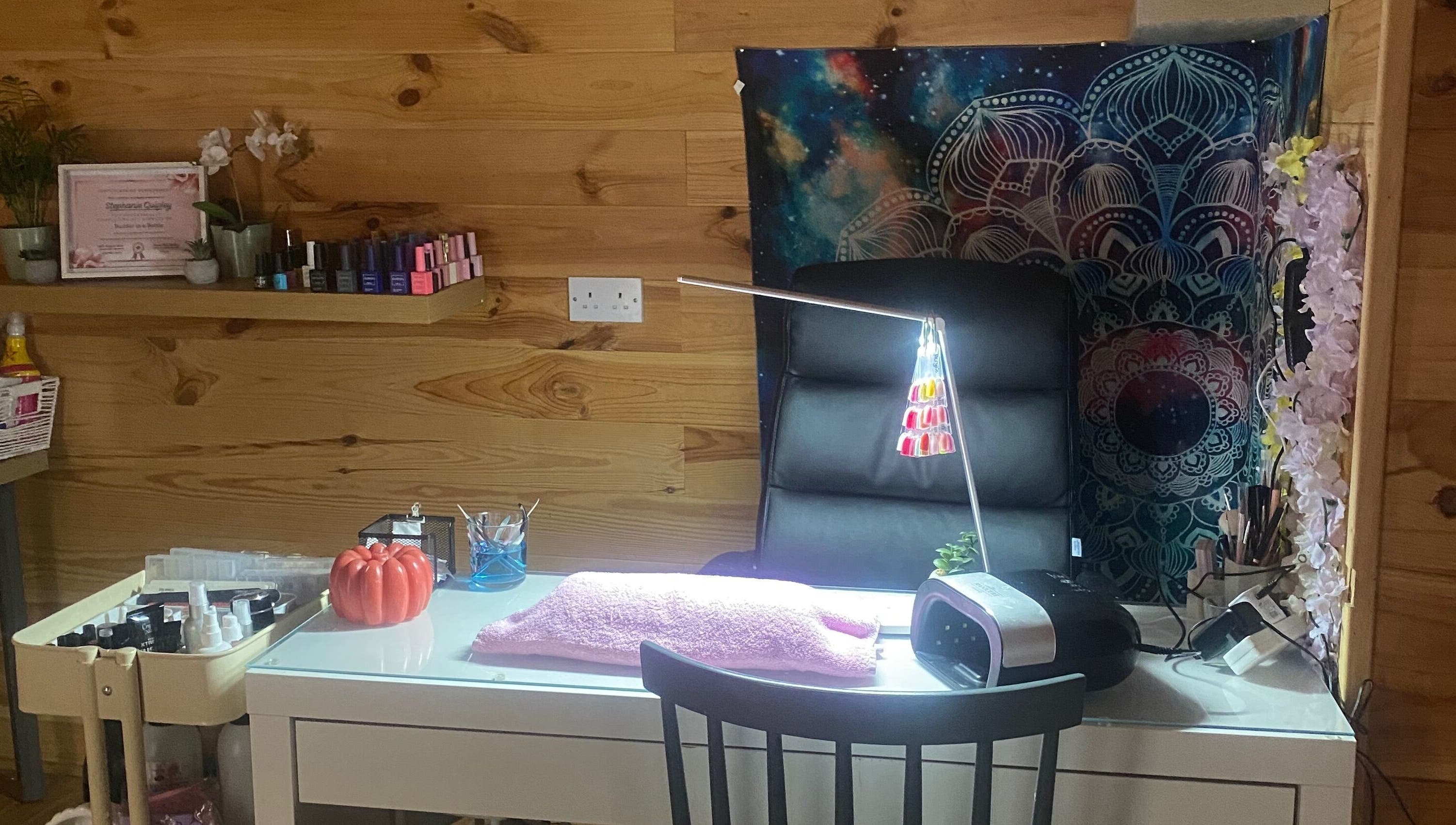 Chic nail station at TheBeautyCabin, Delvin, County Westmeath, IE with nail polish and stylish decor.