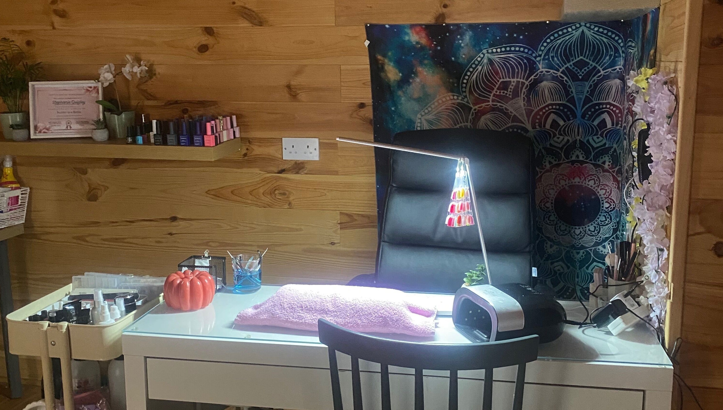 Chic nail station at TheBeautyCabin, Delvin, County Westmeath, IE with nail polish and stylish decor.