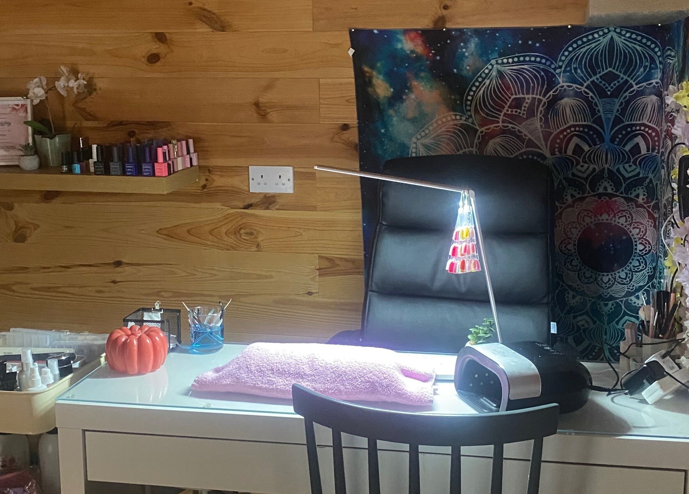 Chic nail station at TheBeautyCabin, Delvin, County Westmeath, IE with nail polish and stylish decor.