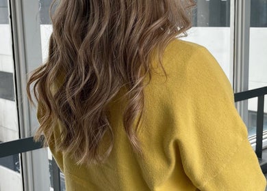Stylish wavy hairstyle at Emily hairstylz, Cape Town, Western Cape, ZA. Perfect for a chic, modern look.