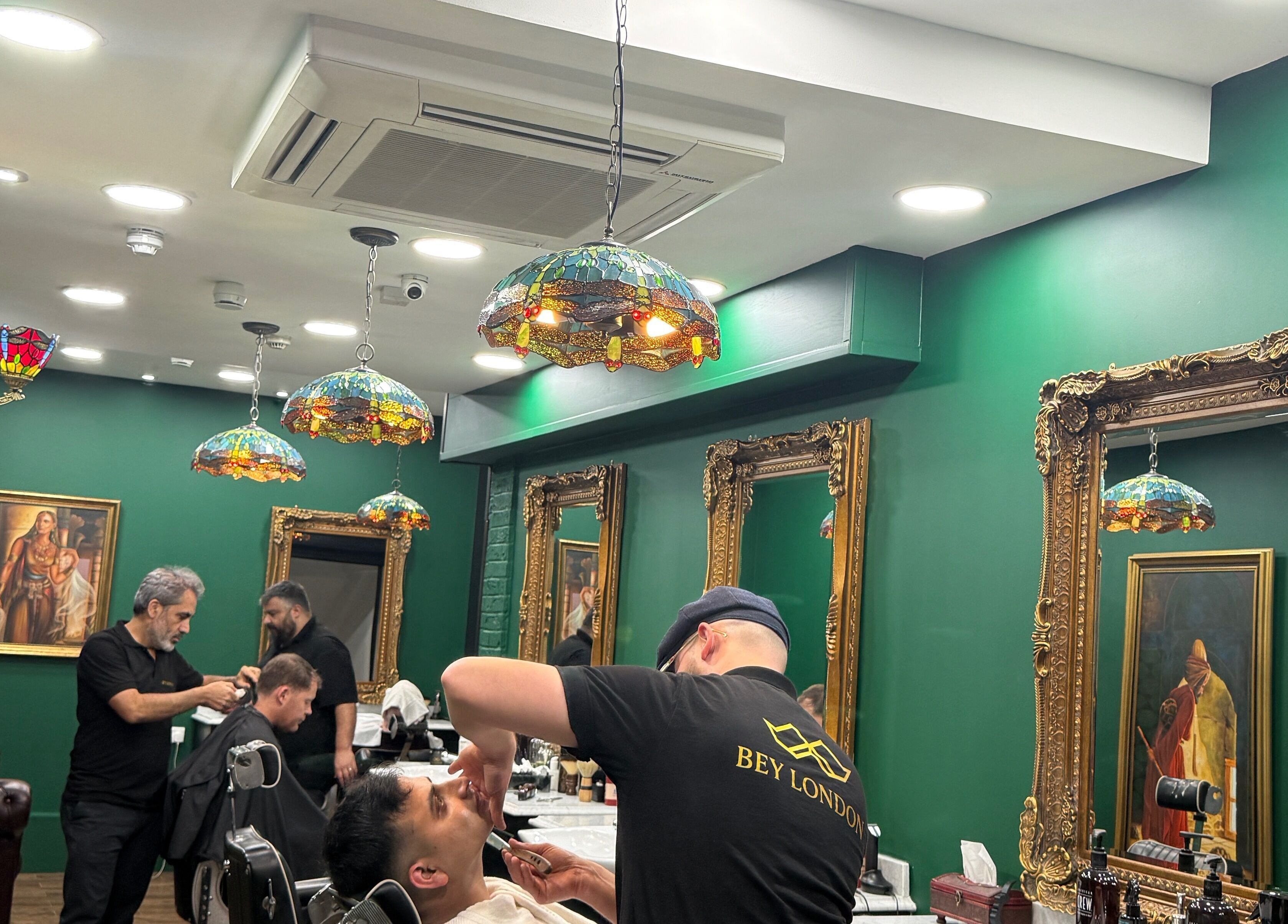 Bey London barbers providing grooming services in a stylish salon, London, England, GB.