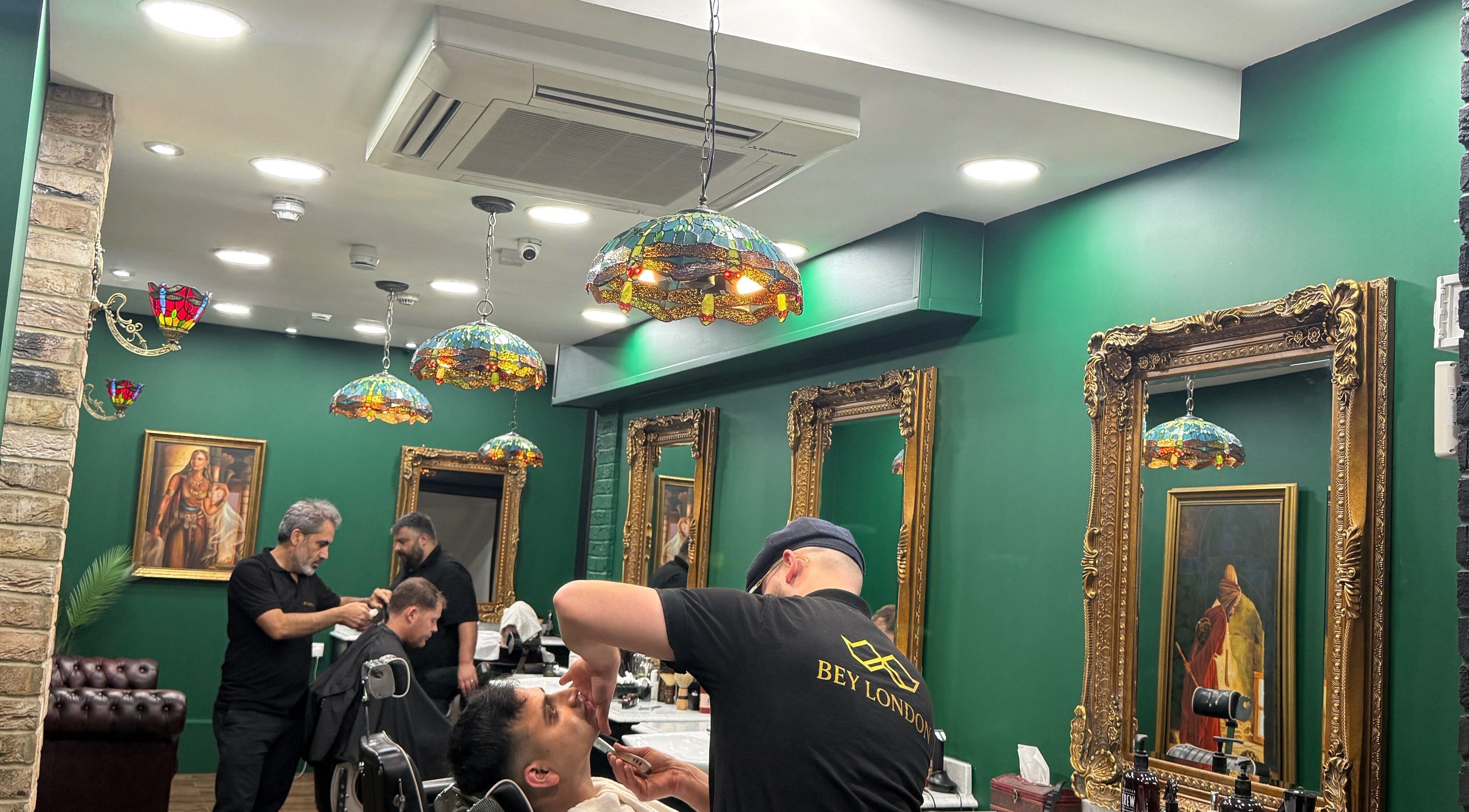 Bey London barbers providing grooming services in a stylish salon, London, England, GB.
