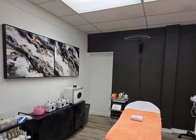 Elegant treatment room at Beauty & Body Sugaring Sarnia in Sarnia, Ontario, CA with modern decor and equipment.