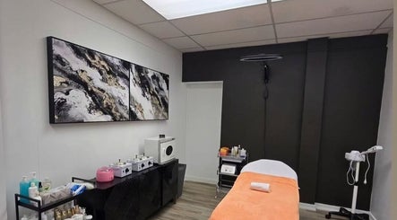 Elegant treatment room at Beauty & Body Sugaring Sarnia in Sarnia, Ontario, CA with modern decor and equipment.