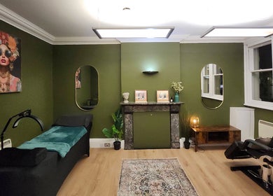 Relaxing beauty room at Tati Beauty in Manchester, England, GB, featuring elegant decor and ambient lighting.