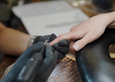 Professional nail care at Tati Beauty, Manchester, England, GB featuring expert manicure services.