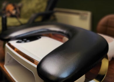 Luxurious black armrest at Tati Beauty, Manchester, England, GB, enhancing the client comfort experience.