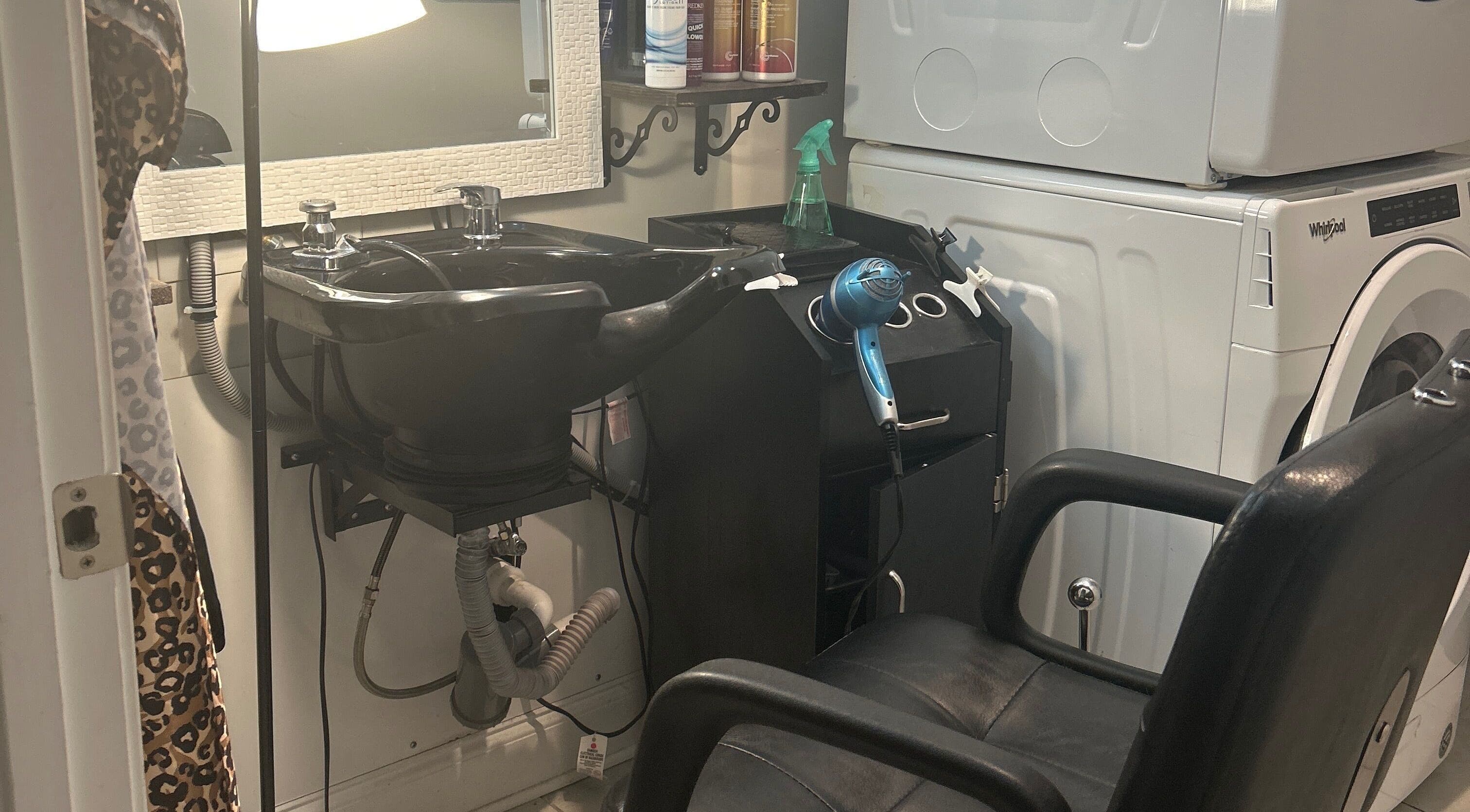 Modern salon chair and sink at Emily Carter Hair Services, Gallatin, Tennessee, US. Cozy and inviting space.