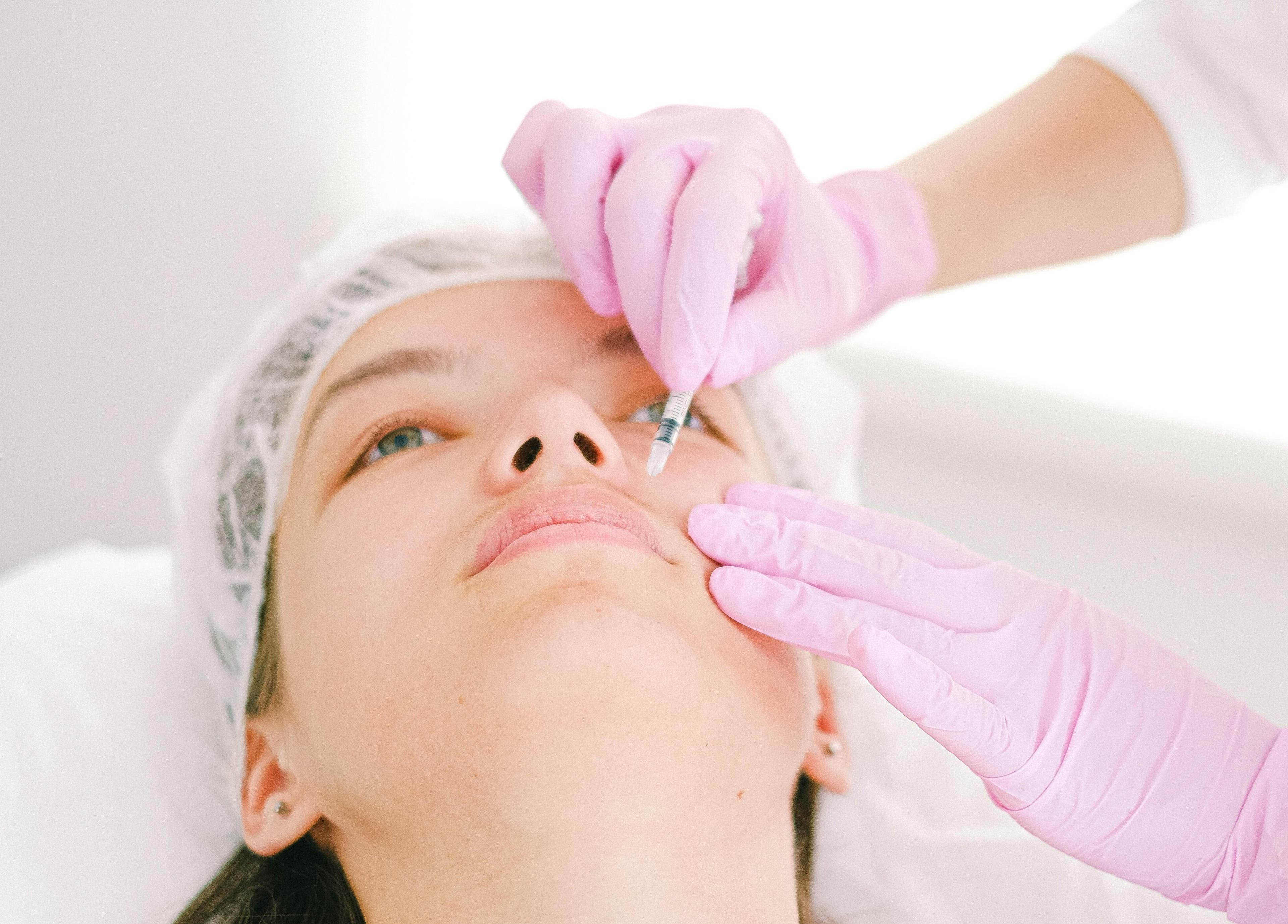 Facial procedure at SWEY Aesthetics, Milton Keynes, England, GB showcasing premium beauty treatments.