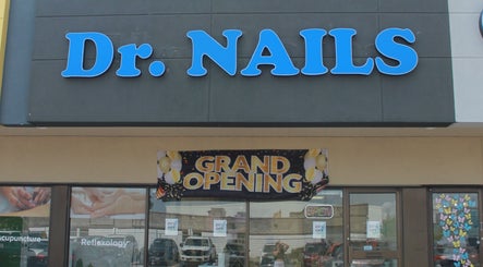Front view of Dr. Nails Georgetown at Halton Hills, Ontario, CA, with grand opening banner.