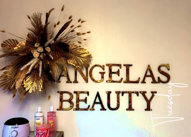 Golden decor at Angela's Beauty, Bradford, England, GB showcasing luxury and elegance.