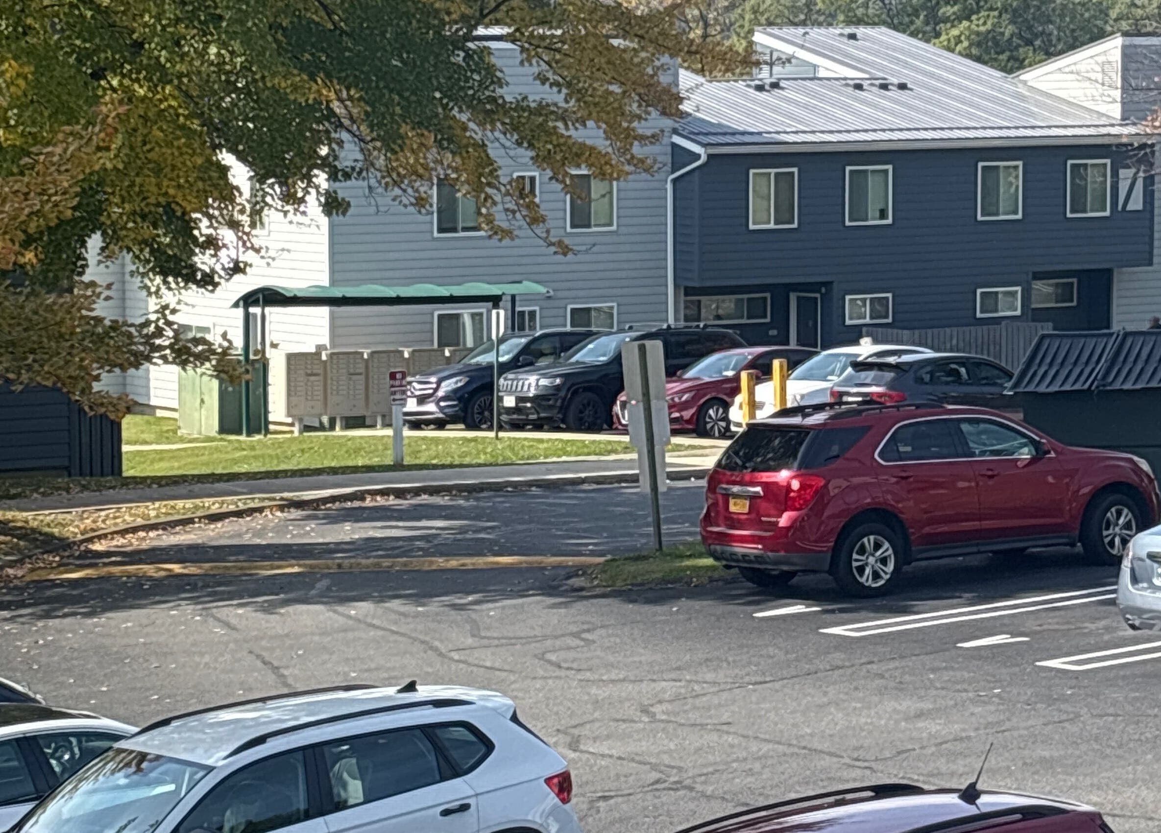Scenic parking area with trees at Leschae Braids 2.0, Beacon, New York, US.