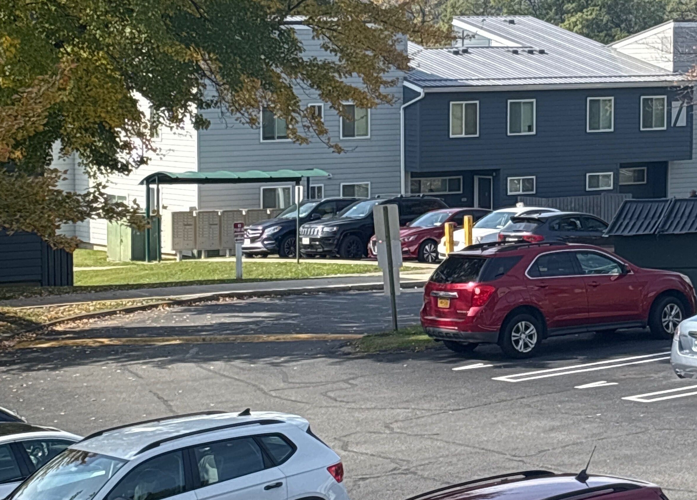 Scenic parking area with trees at Leschae Braids 2.0, Beacon, New York, US.