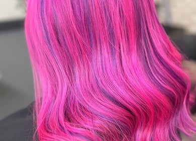 Vibrant pink and purple hair color by Vikki’s Hair in Appledore, England, GB.