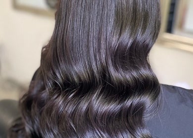Smooth, glossy waves styled at Vikki’s Hair in Appledore, England, GB.