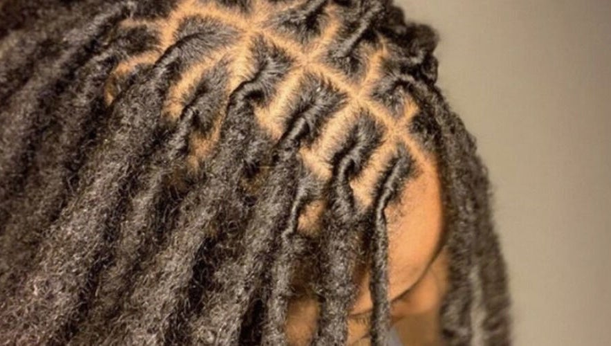 Close-up of locs hairstyle at Retwist Locs, Nassau, New Providence, BS.