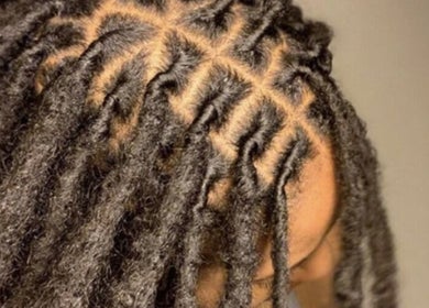 Close-up of locs hairstyle at Retwist Locs, Nassau, New Providence, BS.