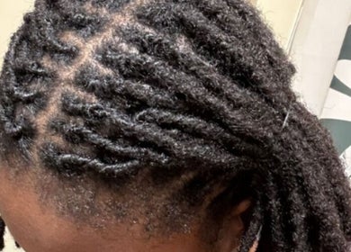 Beautifully maintained locs at Retwist Locs, Nassau, New Providence, BS.
