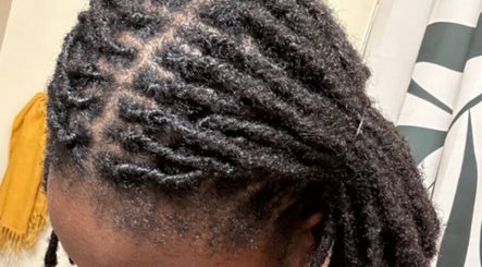 Beautifully maintained locs at Retwist Locs, Nassau, New Providence, BS.