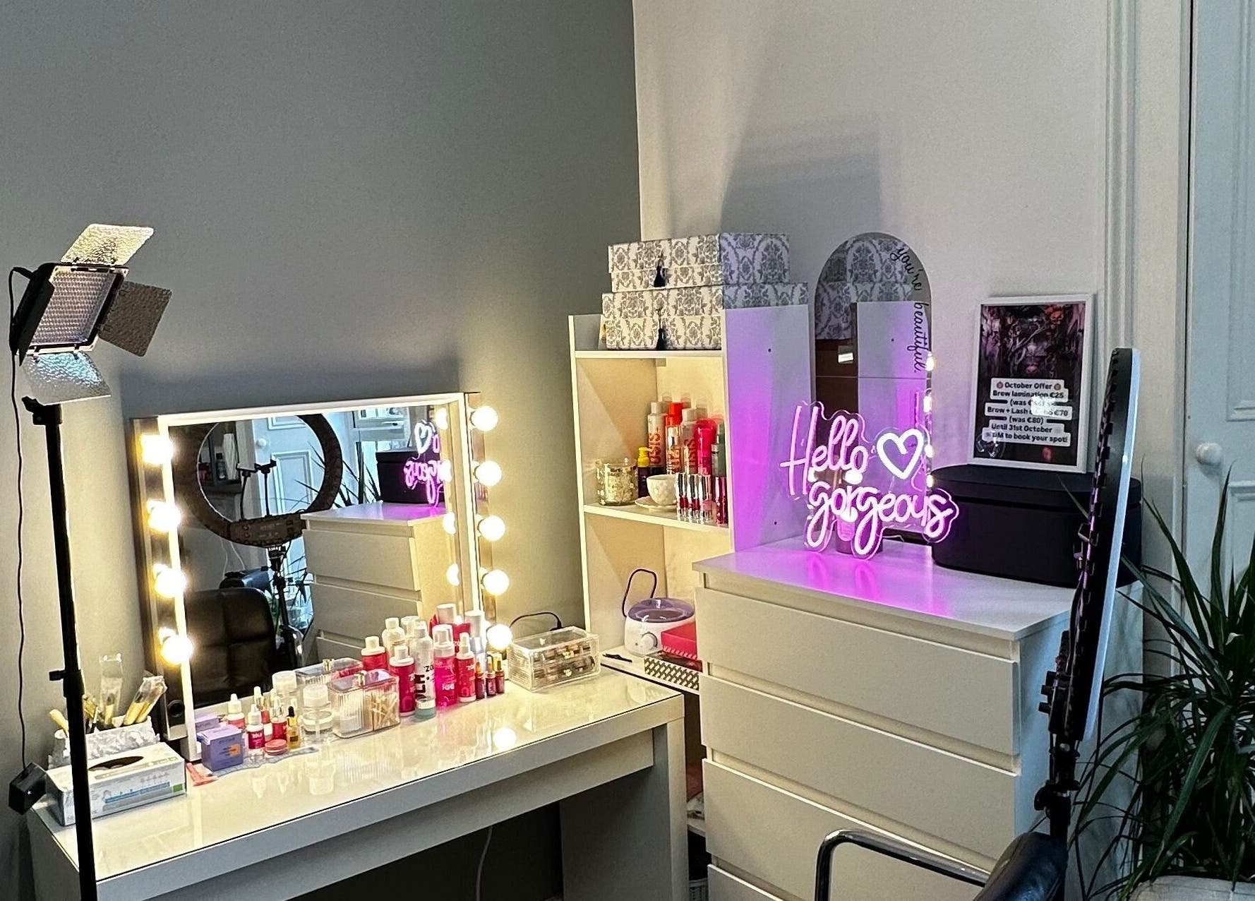 Glamorous beauty station at Alina Kotik, Mullingar, County Westmeath, IE, with illuminated mirror and neon sign.