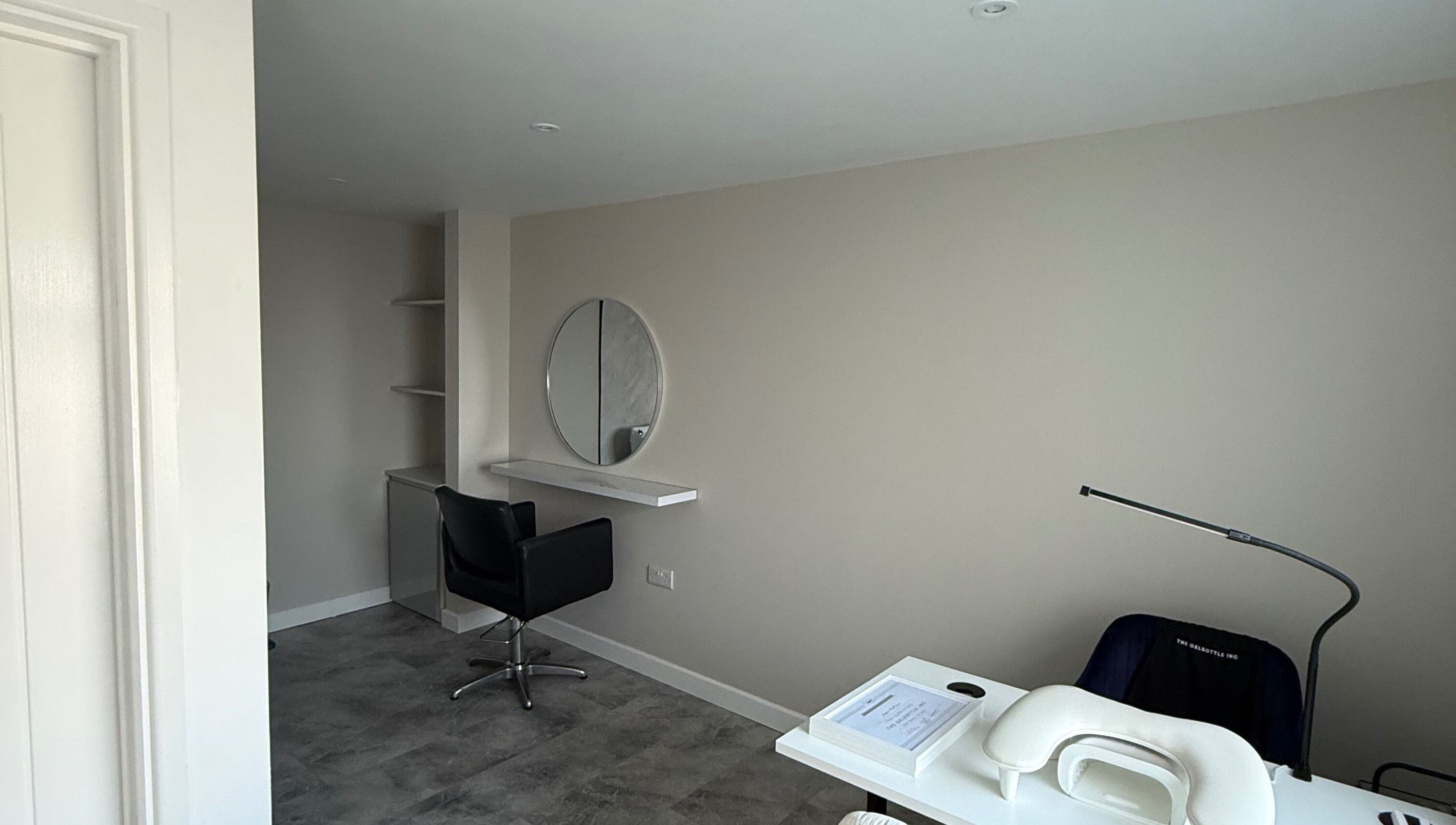 Modern salon space at Honey Luxe Nails in Gosport, England with sleek decor and professional styling chair.