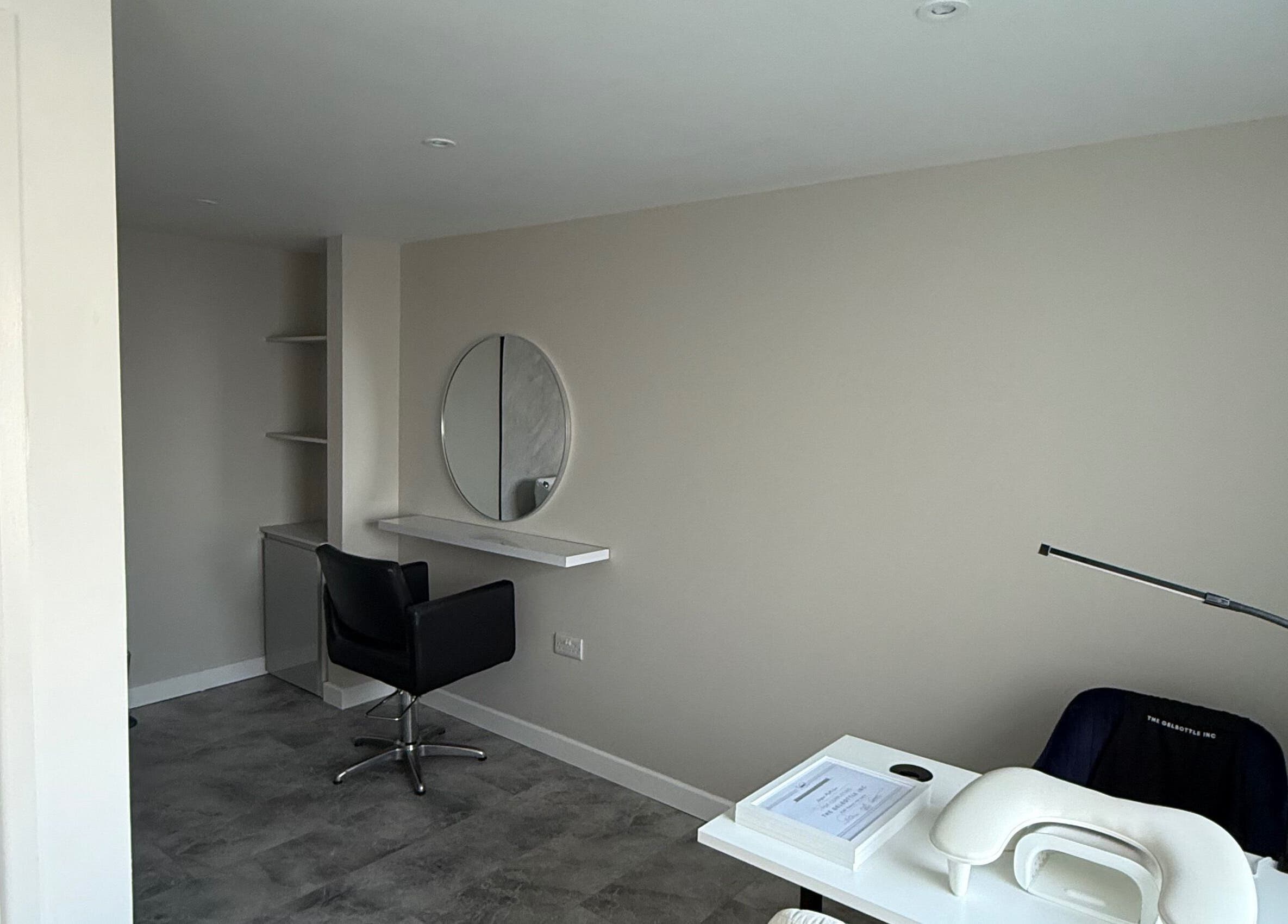Modern salon space at Honey Luxe Nails in Gosport, England with sleek decor and professional styling chair.