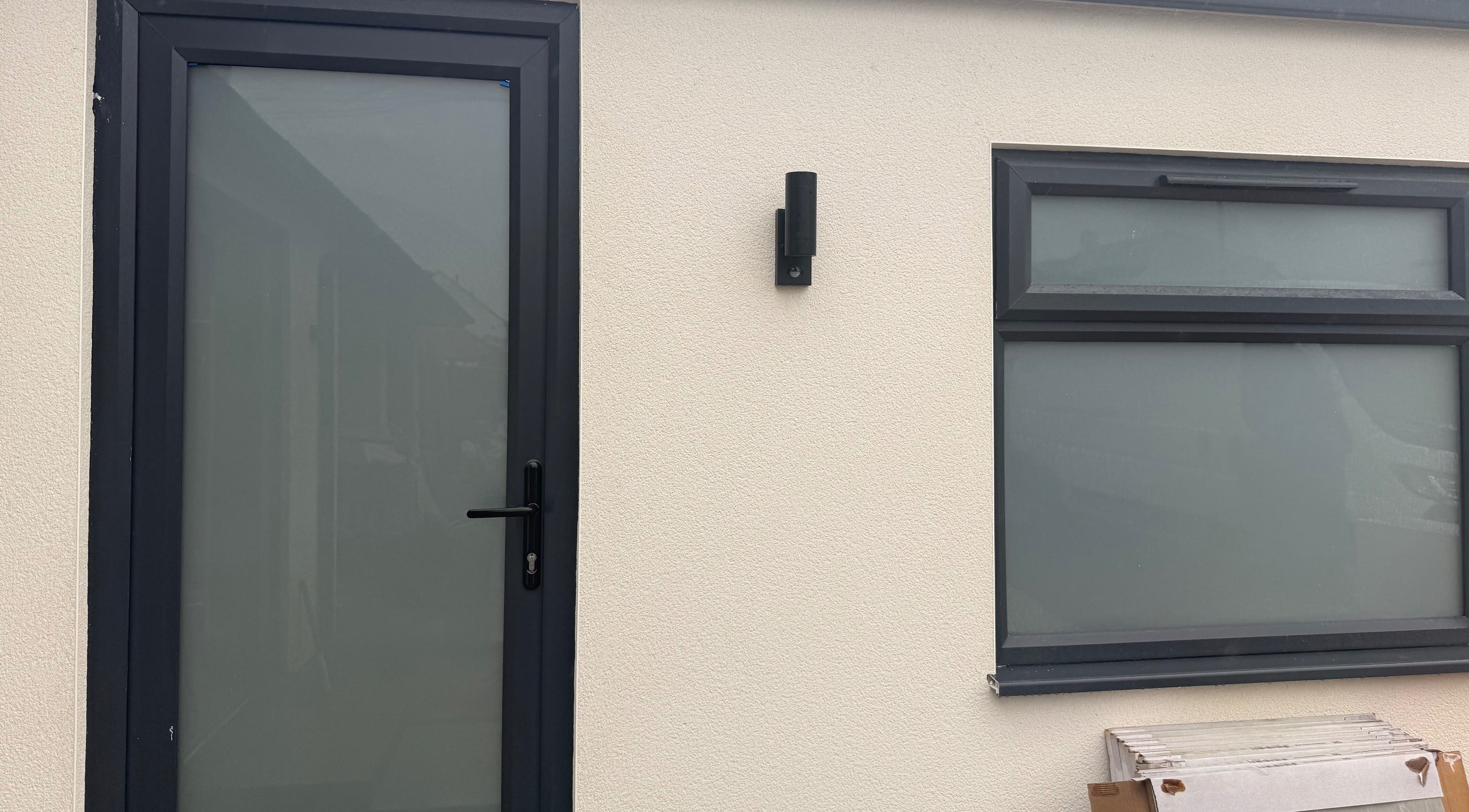 Sleek entrance of Honey Luxe Nails in Gosport, England, GB with frosted glass door and window.
