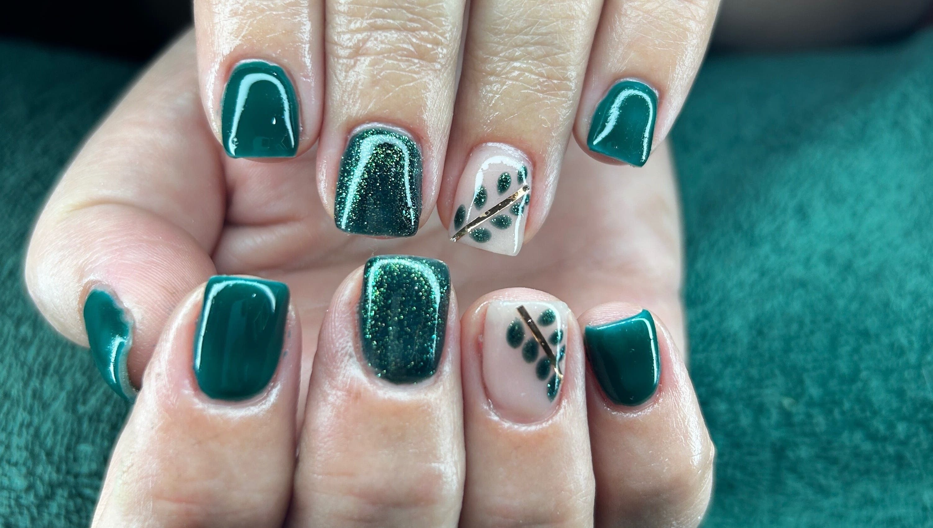 Elegant green nail art with leafy designs at Nicky’s Nails, Gqeberha, Eastern Cape, ZA.