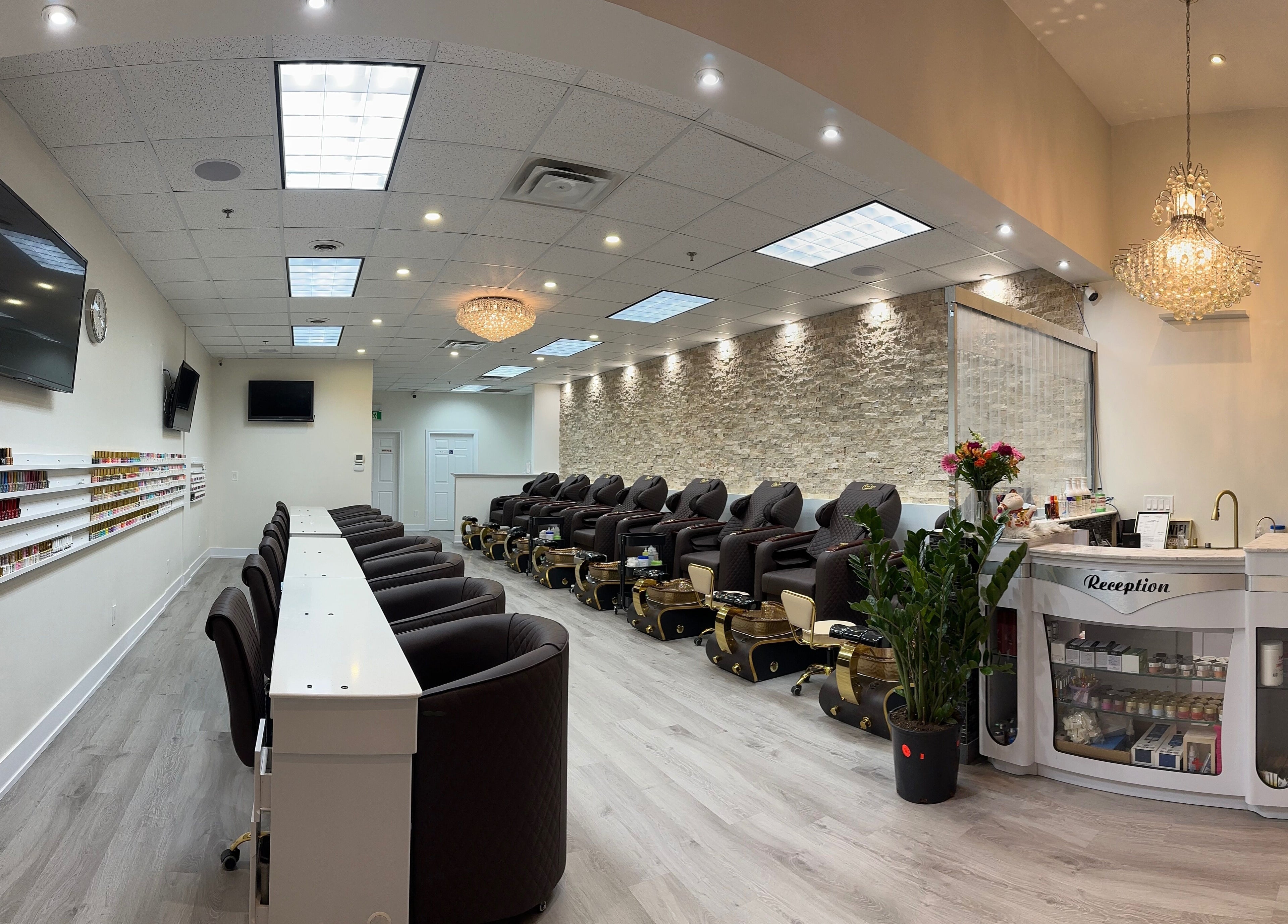 Elegant interior of Nails For You in Brampton, Ontario, CA with luxurious pedicure chairs and reception.